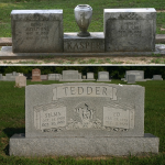 Companion headstone with vase and traditional companion headstone
