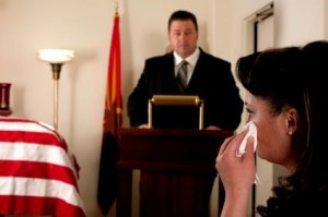 Man Giving A Eulogy At A Military Funeral